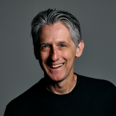 headshot for Dean Schuster